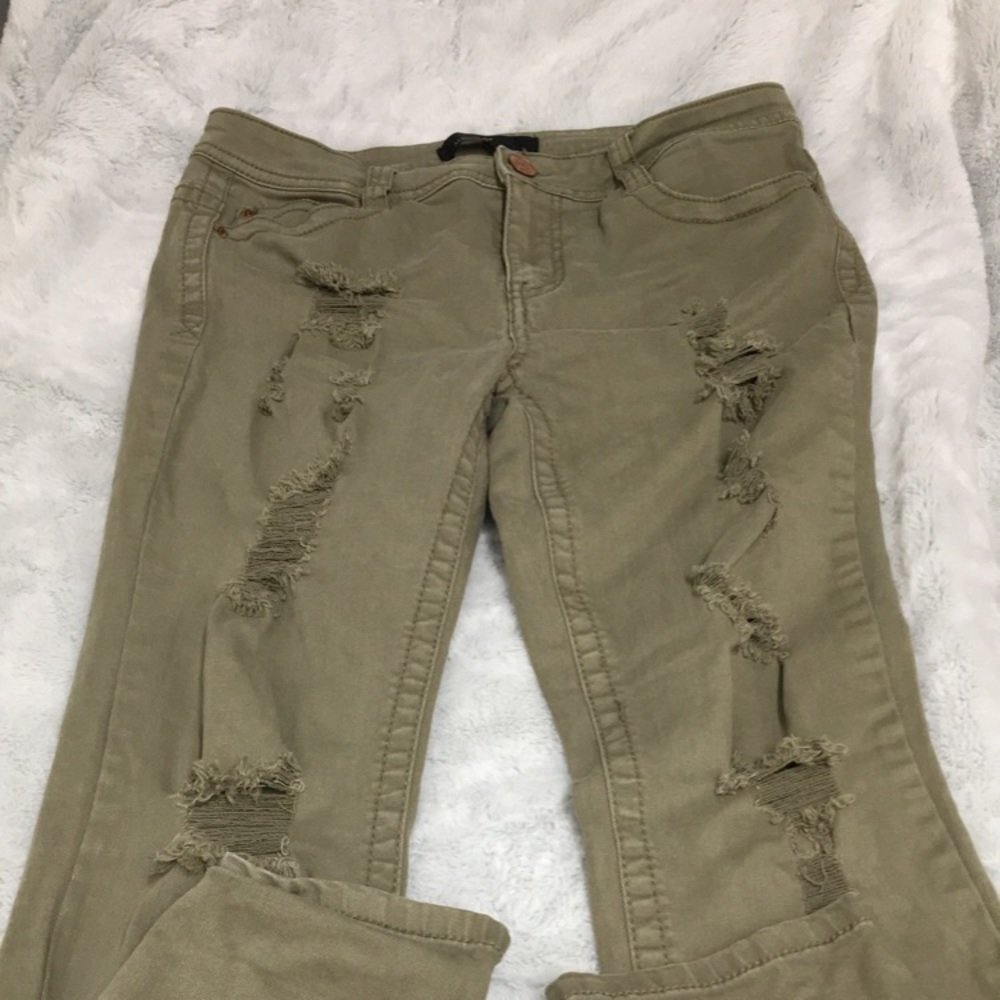 Green ripped jeans